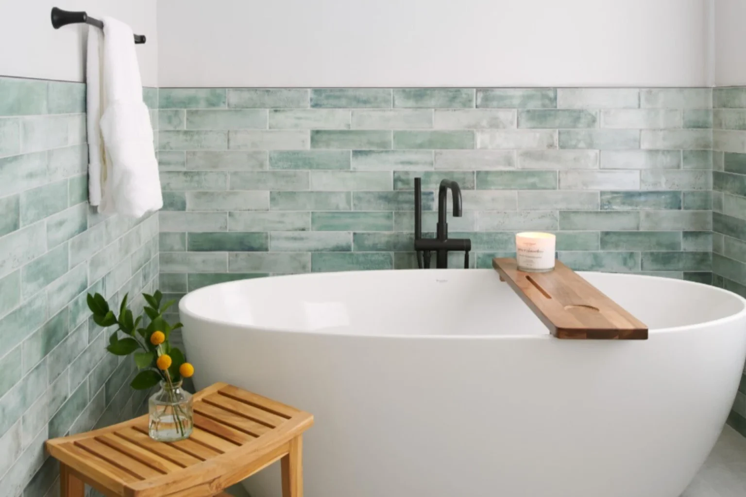 luxurious soaker tub with greenwile background general contractor project